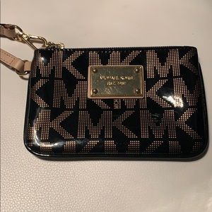 Michael kora wristlet